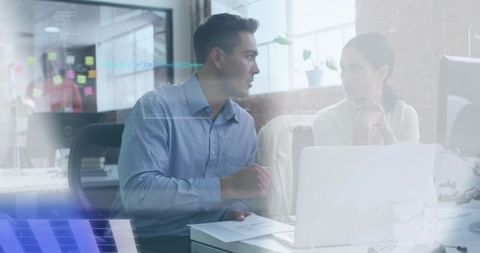 Colleagues Collaborating in Modern Office, Discussing Ideas