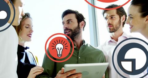 Collaborative team discussing ideas with technology