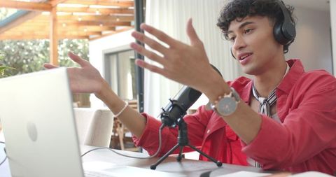 Young Man Engaging Audience with Outdoor Podcast Setup