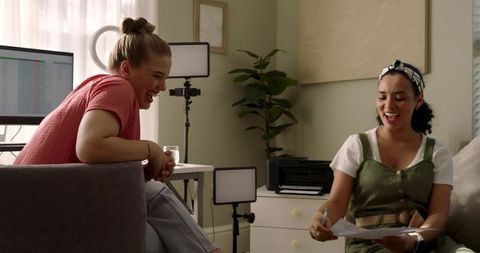 Female Colleagues in Home Office Collaboration with Technology