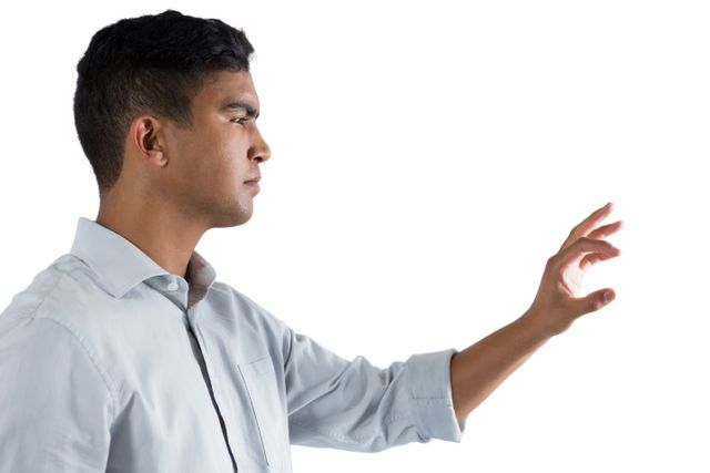Man pretending to touch an invisible screen - Download Free Stock Photos Pikwizard.com