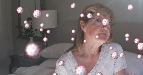 Elderly Woman and Digital Virus Icons Symbolizing COVID-19 Concerns
