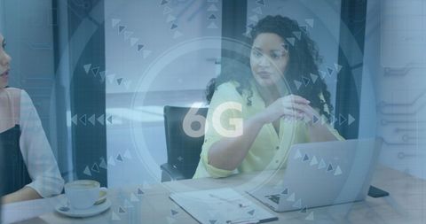 Diverse team meeting discussing 6g technology innovations