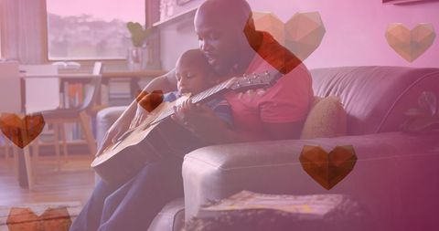 Father Teaching Child Guitar Surrounded by Heart Icons