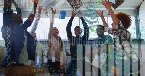 Successful Business Team Celebrating Project Completion in Modern Office