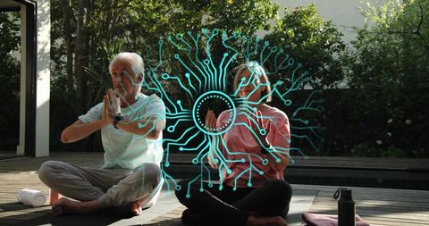 Mature couple meditating outdoors on deck with teal tech circuit overlay for wellness