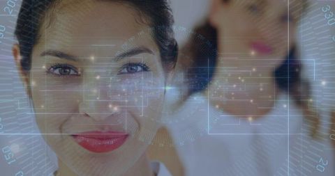 Smiling female professional using augmented reality hud for team collaboration and data