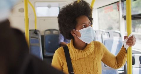 Woman with Face Mask on Bus During COVID-19 Pandemic - Download Free Stock Images Pikwizard.com