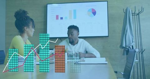 Corporate Professionals Analyzing Financial Data in Modern Boardroom