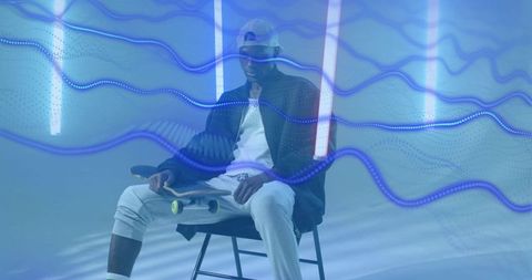 Contemporary Skateboarder Surrounded by Neon Waves in Studio Setting