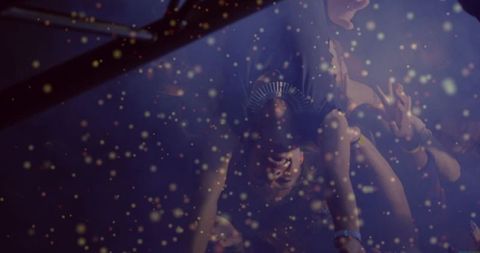 Vibrant concert crowd-surfer at festival extreme energy