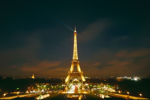 Eiffel Tower Illuminated at Night in Paris - Download Free Stock Photos Pikwizard.com