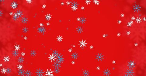 Falling Snowflakes on Red Background for Festive Season