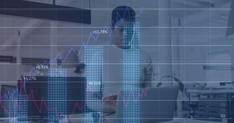 Businesswoman analyzing financial data on laptop in modern office environment