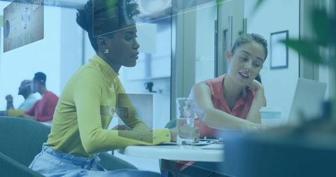 Coworkers Discussing Project with High-Tech Digital Overlays