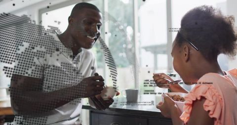 Man and girl sharing breakfast and laughing in kitchen with modern digital data overlay