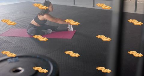 Woman stretching on pink mat in gym surrounded by floating dollar symbols for fitness finance theme