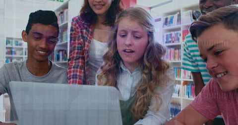 Diverse Students Engaging with Technology in Library Environment