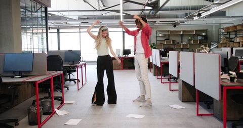 Colleagues Celebrate Success in Modern Office Environment