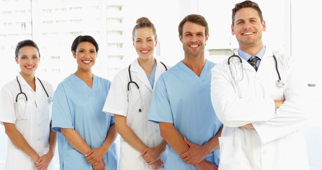 Smiling Healthcare Professionals in Medical Uniform and Doctor Gowns - Download Free Stock Images Pikwizard.com