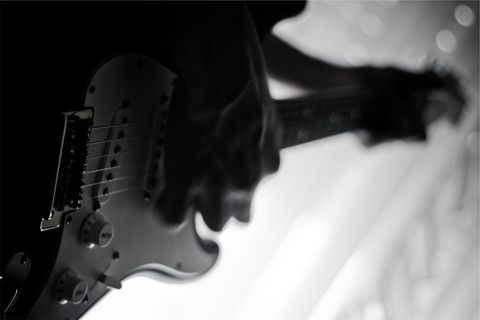 Close-up Black and White View of Electric Guitar