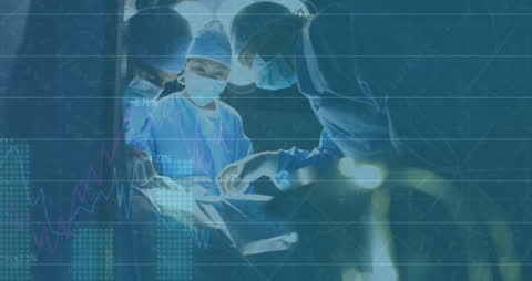 Surgeons Analyzing Digital Data During Procedure