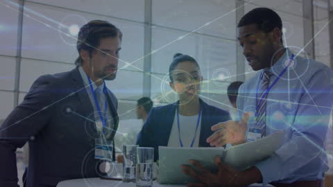 Diverse Business Team Analyzing Data with Digital Network Overlay