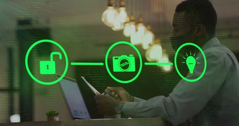 Business Professional Working on Laptop with Cybersecurity Interface