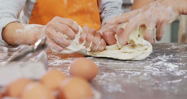 Hands Kneading Dough on Floured Surface in Kitchen - Download Free Stock Images Pikwizard.com