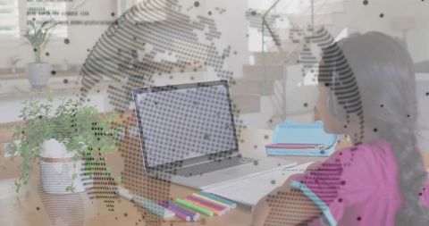 Schoolgirl legisl planning and learning at a home workspace