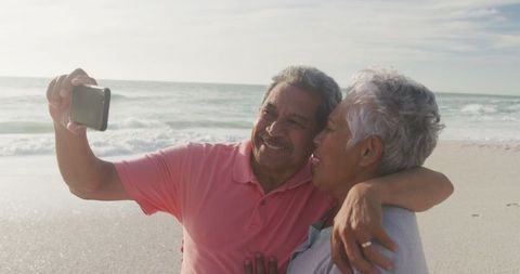 Senior Couple Taking Selfie on Beach at Sunset - Download Free Stock Images Pikwizard.com
