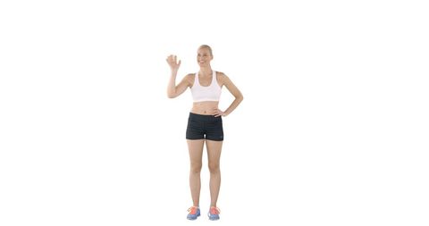 Active Woman in Sporty Outfit Smiling and Waving