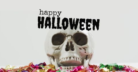 Spooky Skull Display with Halloween Sweets - Download Free Stock Images Pikwizard.com