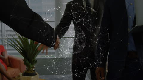 Business Professionals Shaking Hands with Global Digital Network Overlay