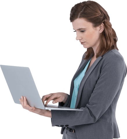 transparent businesswoman typing on laptop with focused expression - Download Free Stock Videos Pikwizard.com