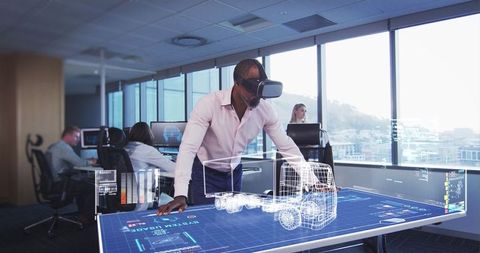 man utilizing vr headset for 3d model design in office environment - Download Free Stock Images Pikwizard.com
