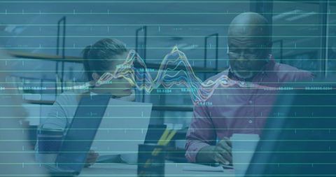 Business Professionals Reviewing Analytics in Modern Office