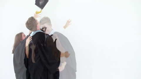 Graduates Celebrating Joyfully with Cap Toss