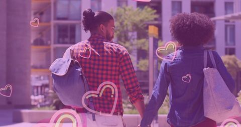 African American Couple Strolling Hand in Hand with Romantic Hearts