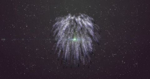 Cosmic willow firework releasing cascading glittering particles with green core flare