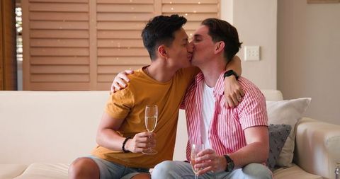 Diverse Gay Couple Sharing Intimate Moment at Home