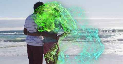 Colorful Elemental Energy Surrounds Couple Embracing on Beach