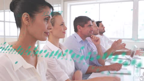 Diverse Team in Meeting Analyzing Financial Data