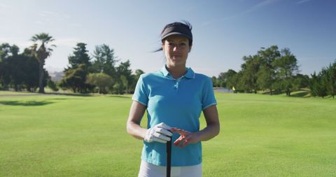 Confident Female Golfer in Sunlit Golf Course - Download Free Stock Images Pikwizard.com