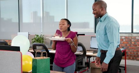 Office Birthday Celebration with Balloons and Cake Surprise
