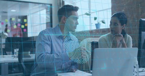 Colleagues Discussing Biometric Technology in Modern Office - Download Free Stock Images Pikwizard.com