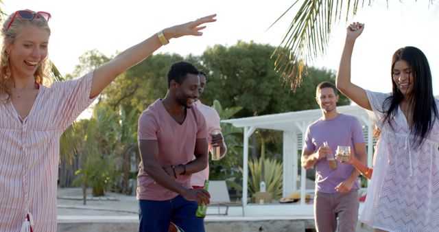 Joyful Friends Dancing with Cocktails on Sunny Beach - Download Free Stock Images Pikwizard.com