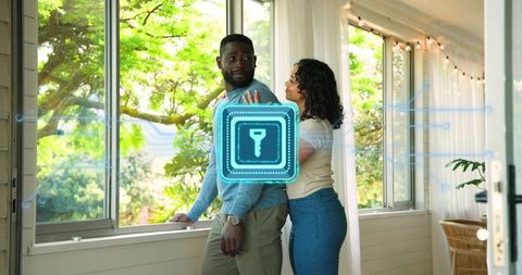 Couple testing smart home access with holographic digital key overlay in sunny sunroom