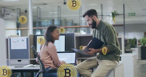 Colleagues Discussing Bitcoin in Modern Office Environment