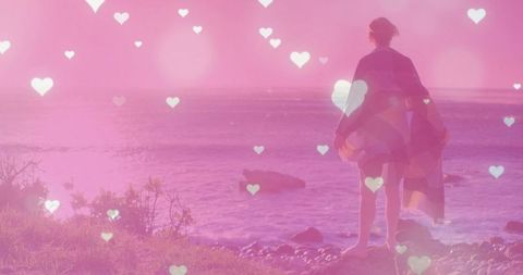 Serene Woman with Towel on Dreamlike Beach at Sunset